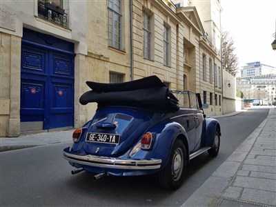 Photo 1 de Visite guidée : Balade guidée dans Paris en Coccinelle décapotable