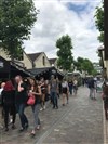 Visite guidée : Balade à Bercy, le parc, les rues avoisinantes, le cour Saint-Emilion ou Bercy Village - Paris Bercy Village
